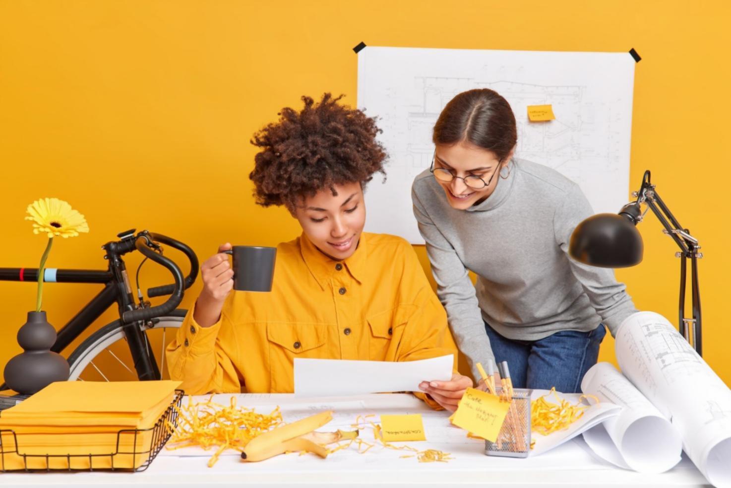 Professional working on financial analysis with charts and reports